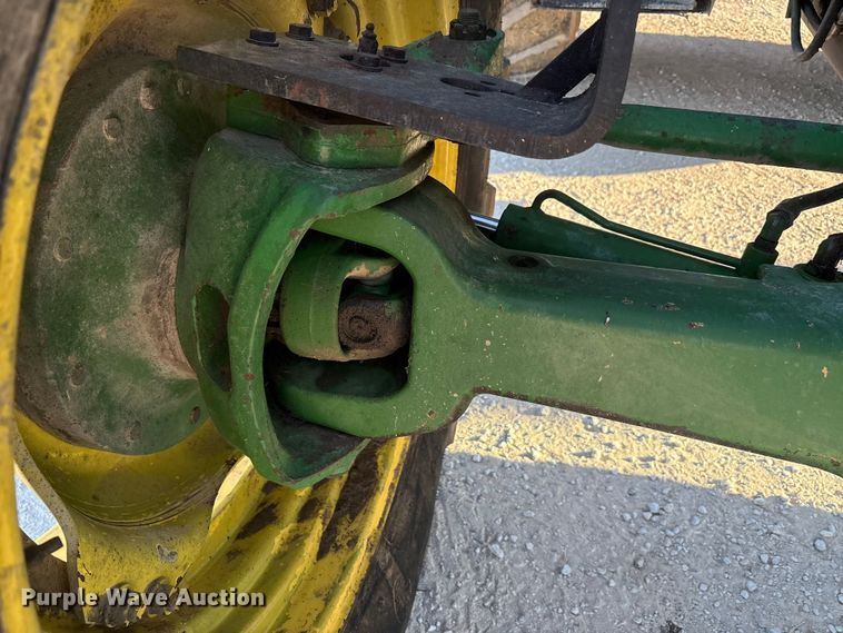 image for item EA7512 1997 John Deere 7810 MFWD tractor