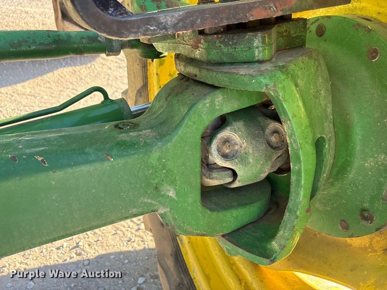 image for item EA7512 1997 John Deere 7810 MFWD tractor