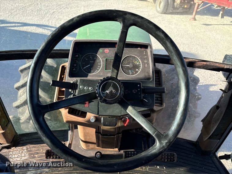 image for item EA7512 1997 John Deere 7810 MFWD tractor