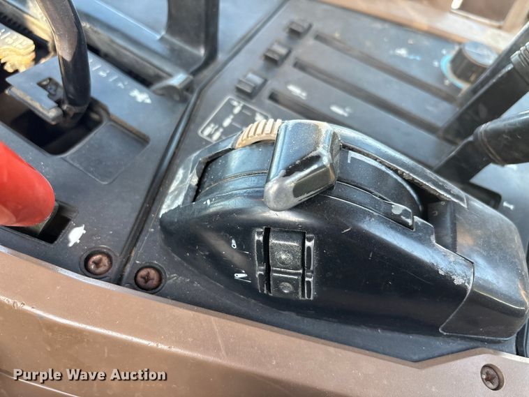 image for item EA7512 1997 John Deere 7810 MFWD tractor