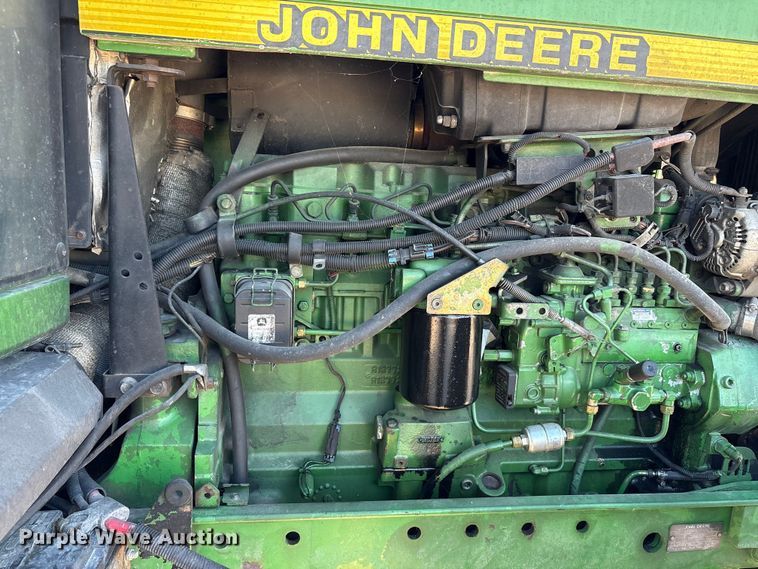 image for item EA7512 1997 John Deere 7810 MFWD tractor