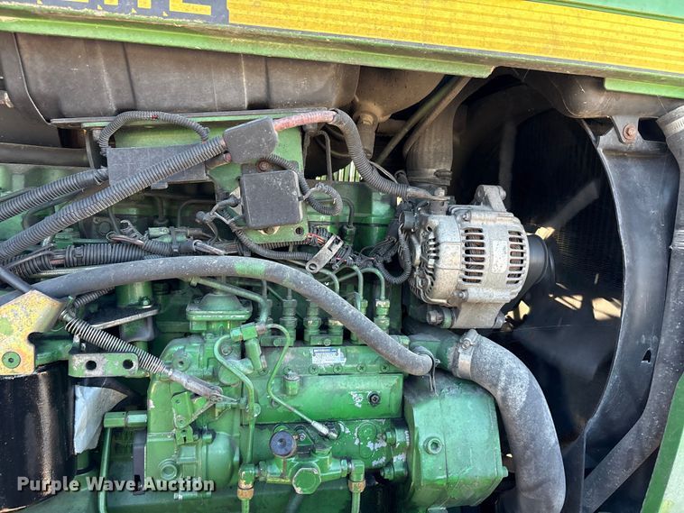 image for item EA7512 1997 John Deere 7810 MFWD tractor