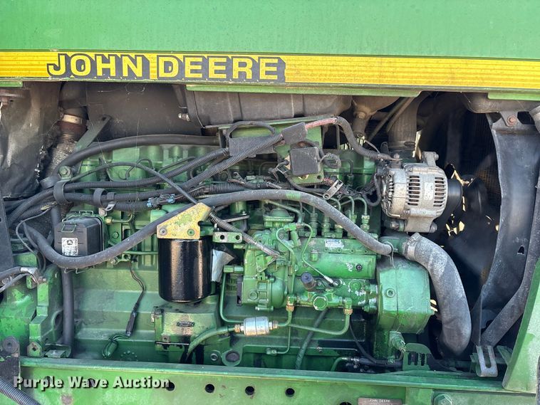 image for item EA7512 1997 John Deere 7810 MFWD tractor