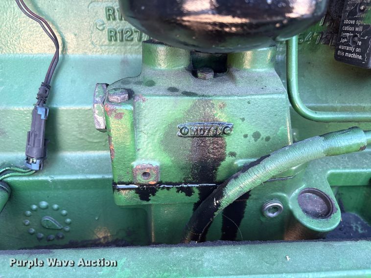 image for item EA7512 1997 John Deere 7810 MFWD tractor