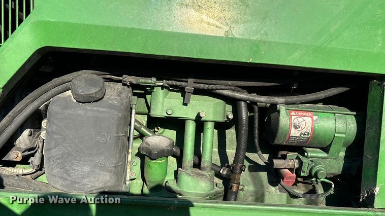 image for item EA7512 1997 John Deere 7810 MFWD tractor