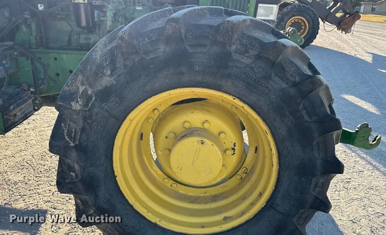 image for item EA7512 1997 John Deere 7810 MFWD tractor