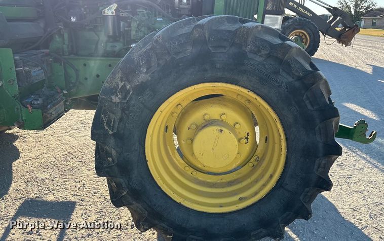 image for item EA7512 1997 John Deere 7810 MFWD tractor