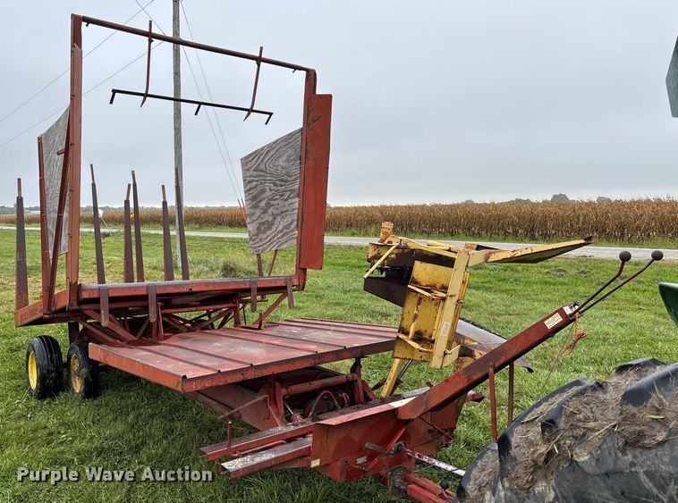 image for item EN7025 New Holland 1030 bale wagon