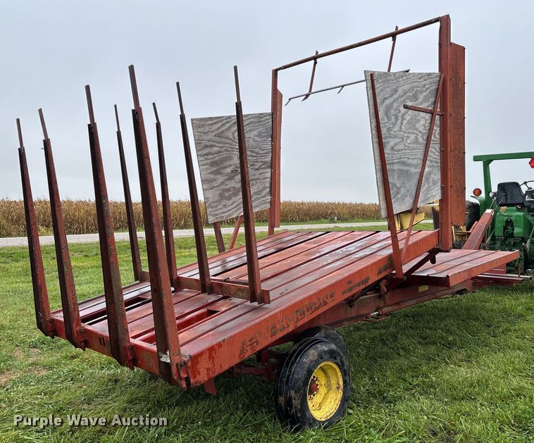 image for item EN7025 New Holland 1030 bale wagon