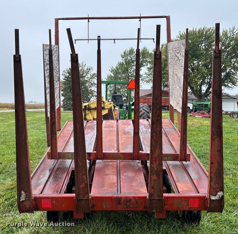 image for item EN7025 New Holland 1030 bale wagon