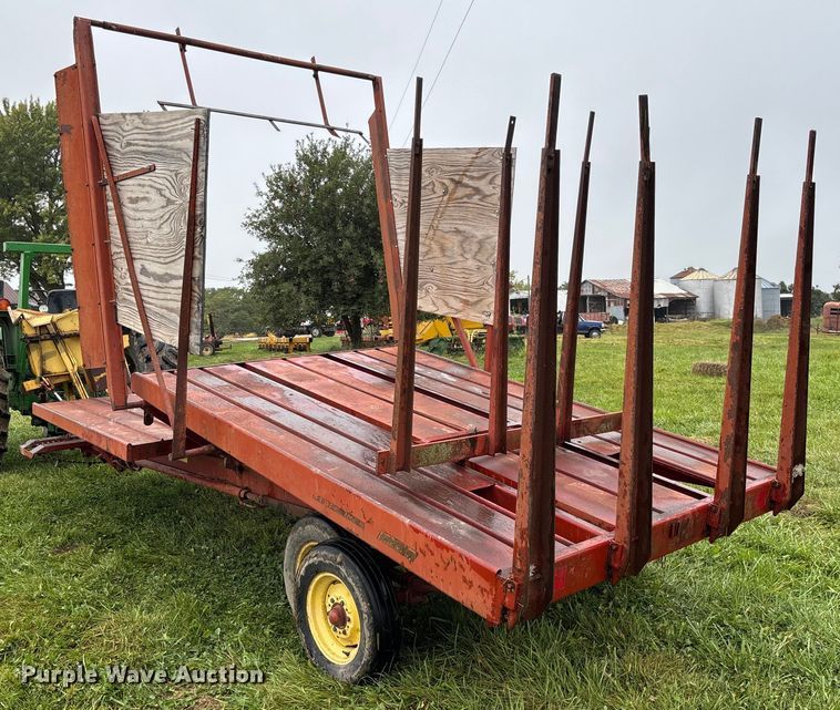 image for item EN7025 New Holland 1030 bale wagon