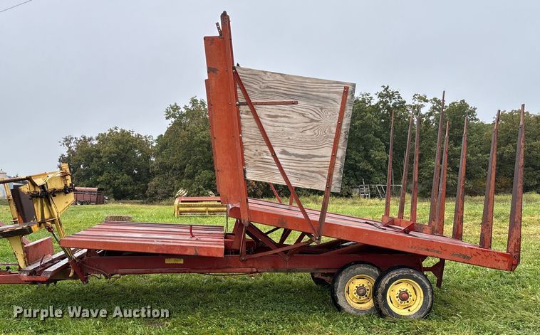 image for item EN7025 New Holland 1030 bale wagon