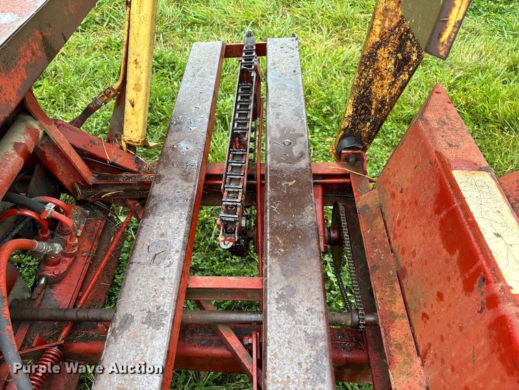 image for item EN7025 New Holland 1030 bale wagon