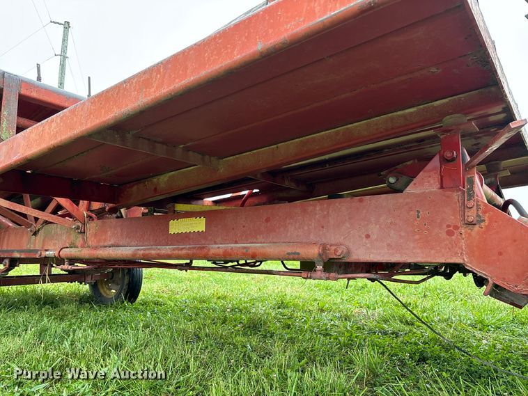 image for item EN7025 New Holland 1030 bale wagon