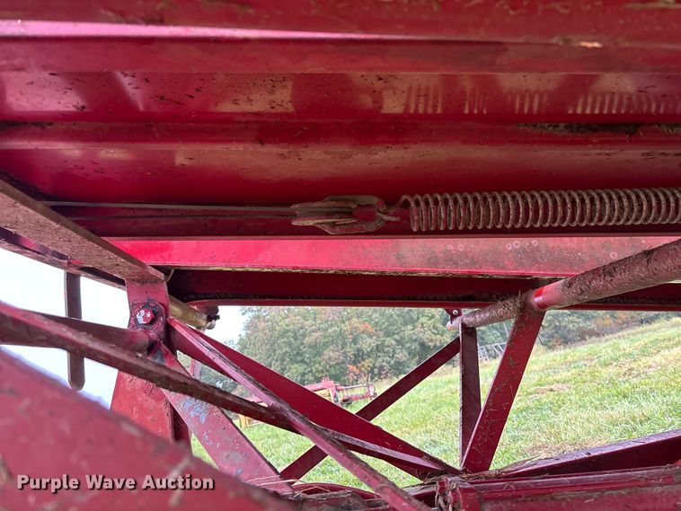 image for item EN7025 New Holland 1030 bale wagon