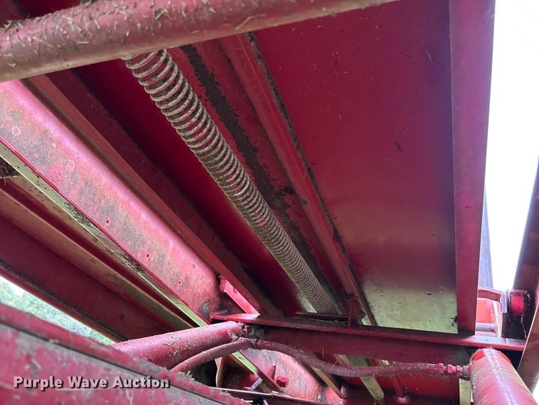 image for item EN7025 New Holland 1030 bale wagon