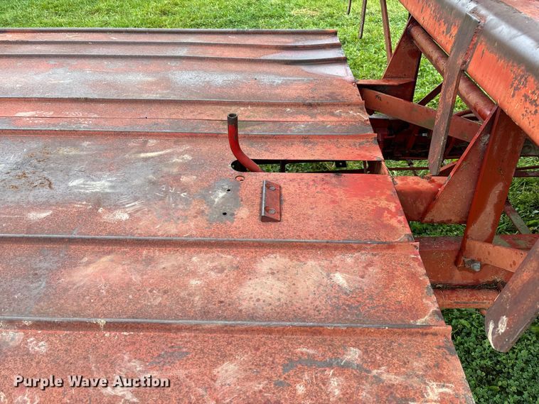 image for item EN7025 New Holland 1030 bale wagon