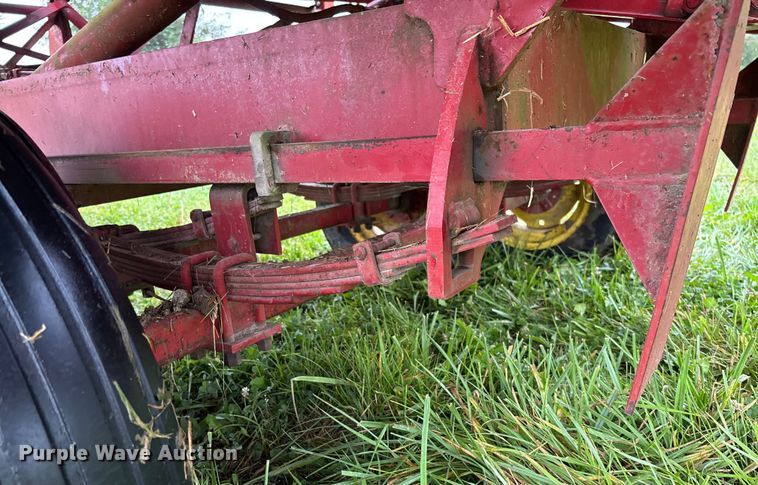 image for item EN7025 New Holland 1030 bale wagon