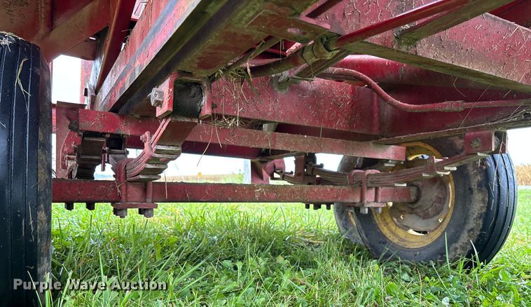 image for item EN7025 New Holland 1030 bale wagon