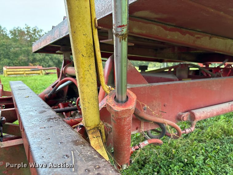 image for item EN7025 New Holland 1030 bale wagon