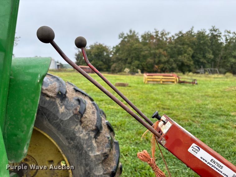 image for item EN7025 New Holland 1030 bale wagon
