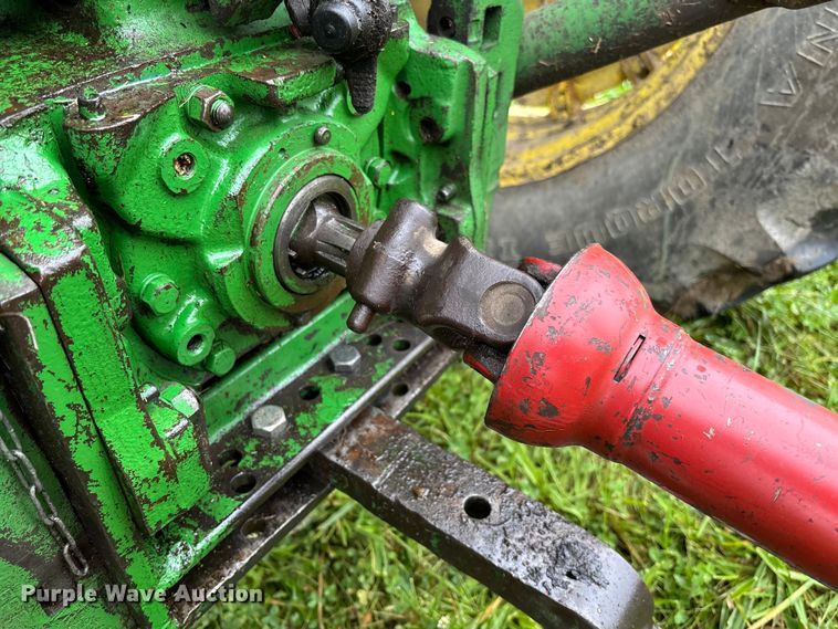 image for item EN7025 New Holland 1030 bale wagon