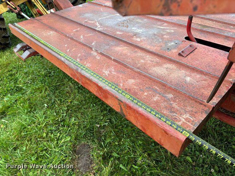 image for item EN7025 New Holland 1030 bale wagon