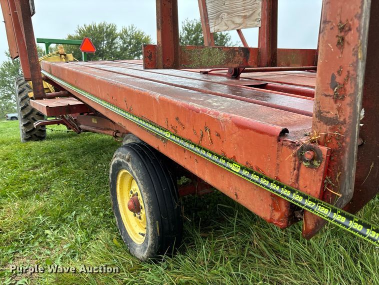 image for item EN7025 New Holland 1030 bale wagon