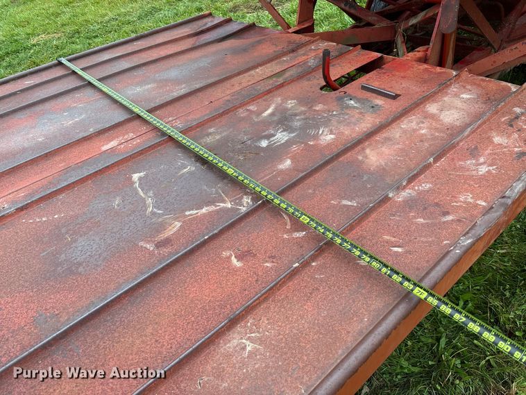 image for item EN7025 New Holland 1030 bale wagon