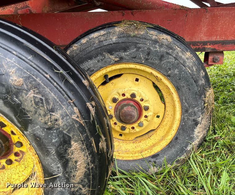 image for item EN7025 New Holland 1030 bale wagon