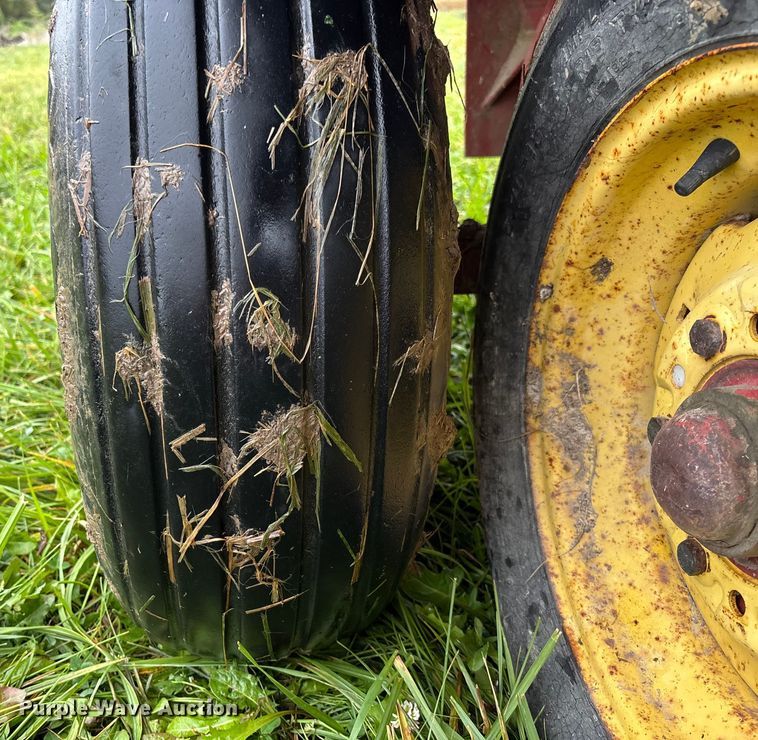 image for item EN7025 New Holland 1030 bale wagon