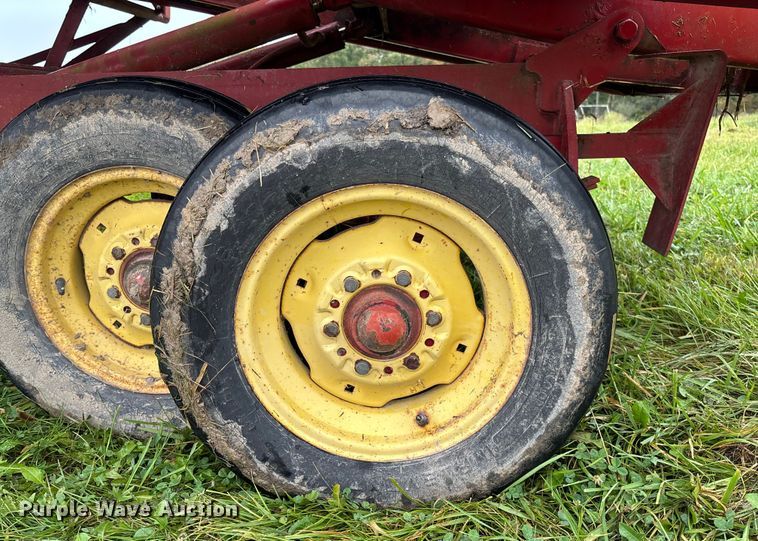 image for item EN7025 New Holland 1030 bale wagon