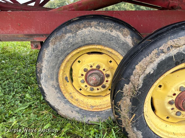 image for item EN7025 New Holland 1030 bale wagon