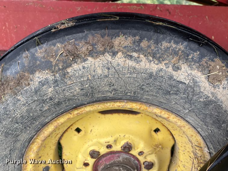 image for item EN7025 New Holland 1030 bale wagon