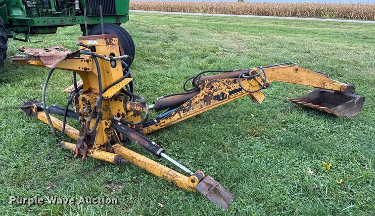 image for item EN7028 Dual BH106 backhoe attachment