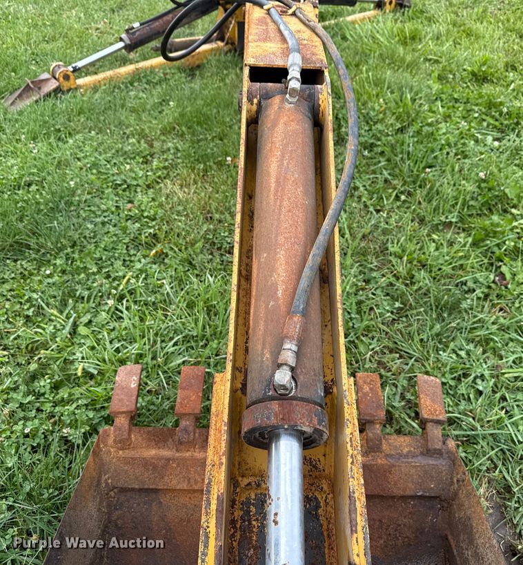 image for item EN7028 Dual BH106 backhoe attachment