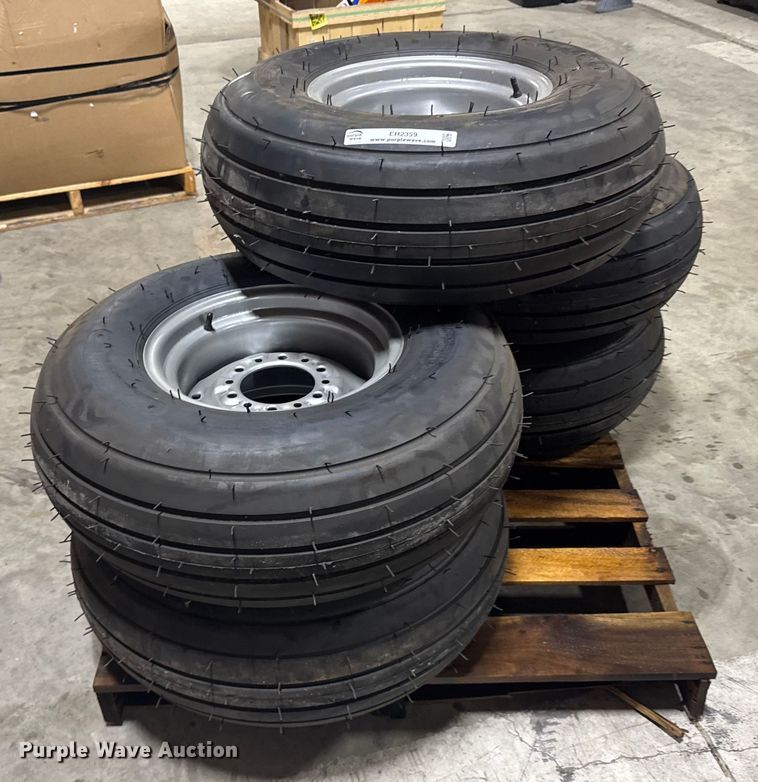 image for item ER2359 (21) 11L-14SL tires and rims