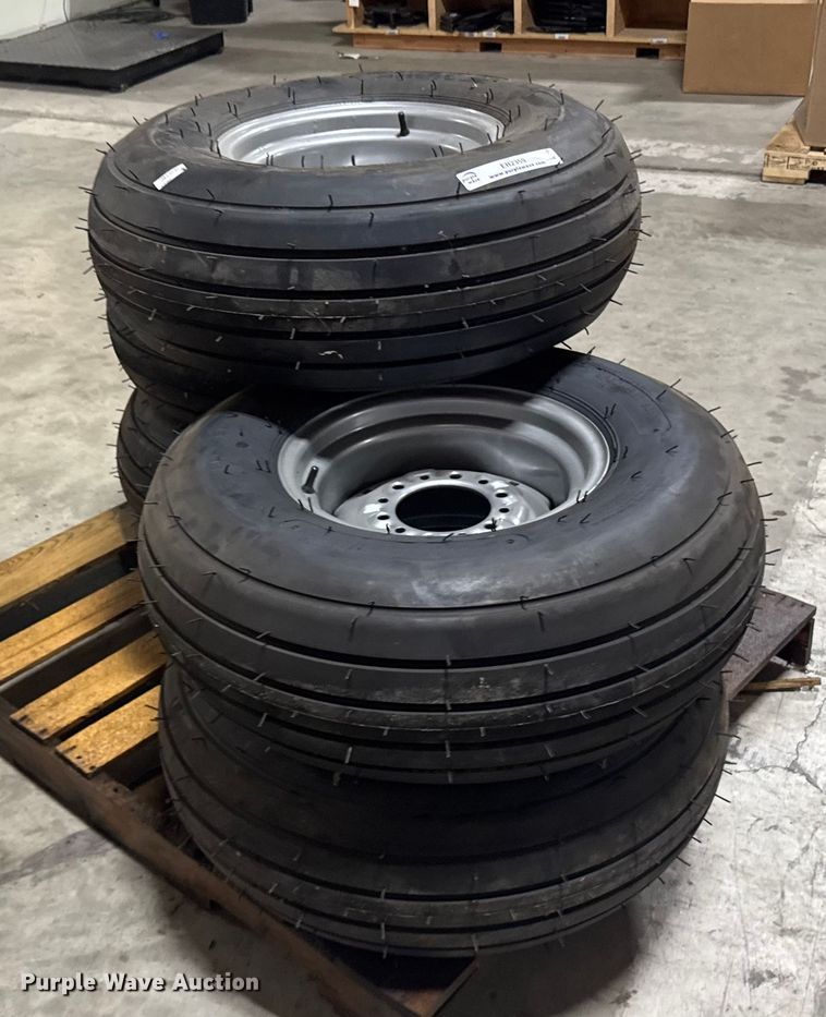 image for item ER2359 (21) 11L-14SL tires and rims