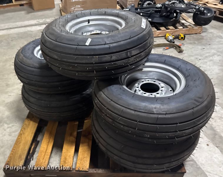 image for item ER2359 (21) 11L-14SL tires and rims