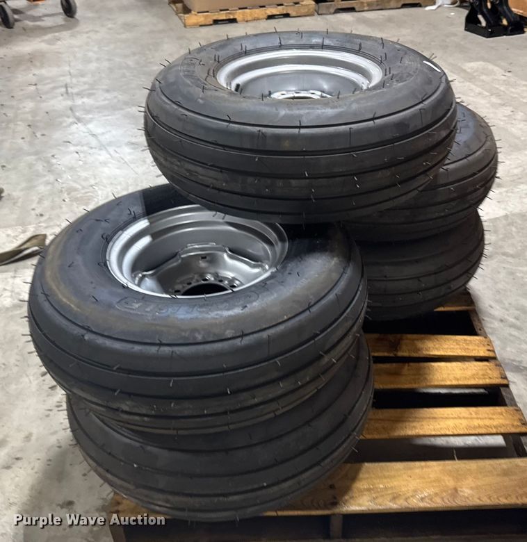 image for item ER2359 (21) 11L-14SL tires and rims