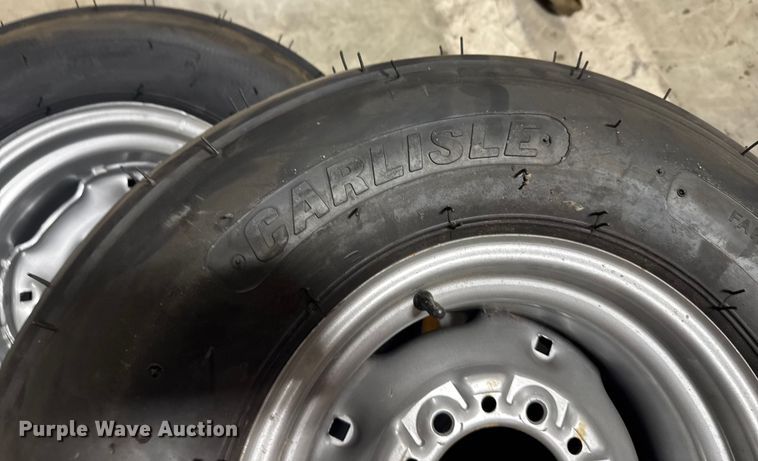 image for item ER2359 (21) 11L-14SL tires and rims