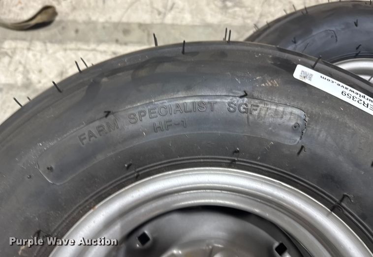 image for item ER2359 (21) 11L-14SL tires and rims