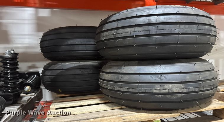 image for item ER2359 (21) 11L-14SL tires and rims