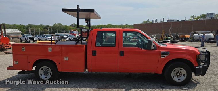 image for item DE2211 2008 Ford F250 Super Duty Crew Cab utility bed pickup truck