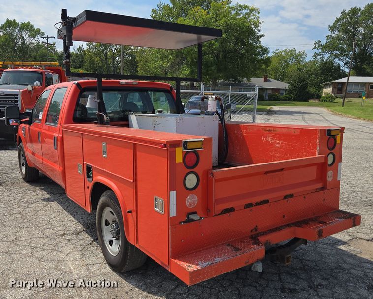 image for item DE2211 2008 Ford F250 Super Duty Crew Cab utility bed pickup truck