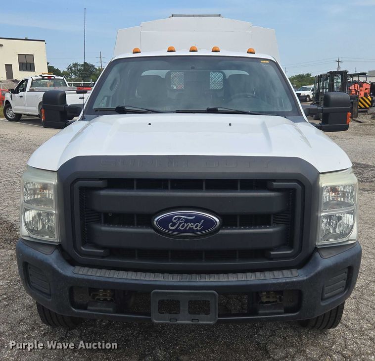 image for item DE2212 2016 Ford F350 Super Duty Crew Cab utility bed pickup truck