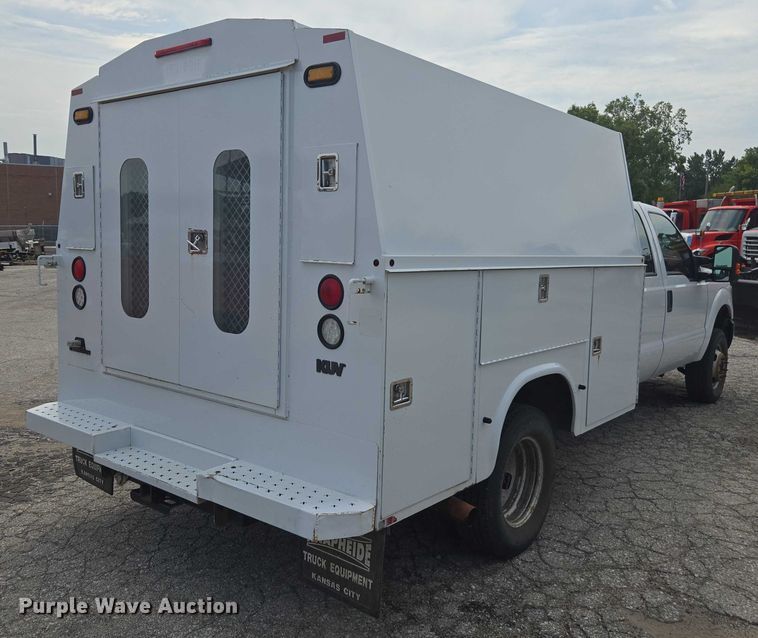 image for item DE2212 2016 Ford F350 Super Duty Crew Cab utility bed pickup truck