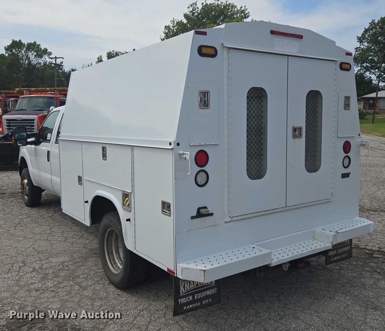 image for item DE2212 2016 Ford F350 Super Duty Crew Cab utility bed pickup truck