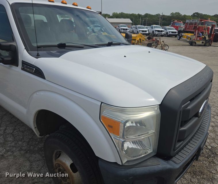 image for item DE2212 2016 Ford F350 Super Duty Crew Cab utility bed pickup truck