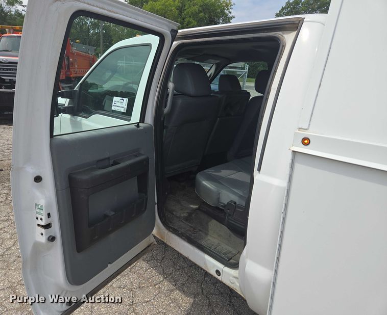 image for item DE2212 2016 Ford F350 Super Duty Crew Cab utility bed pickup truck